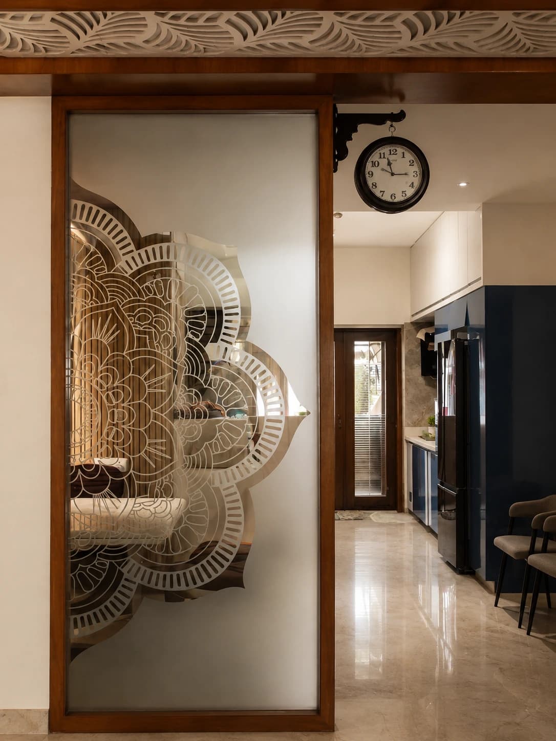 The House of Motifs — the etched sliding screen seen from the living room
